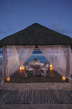 Dine at night in a private cabana